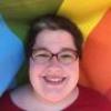 Lorelei Rutledge headshot on rainbow background